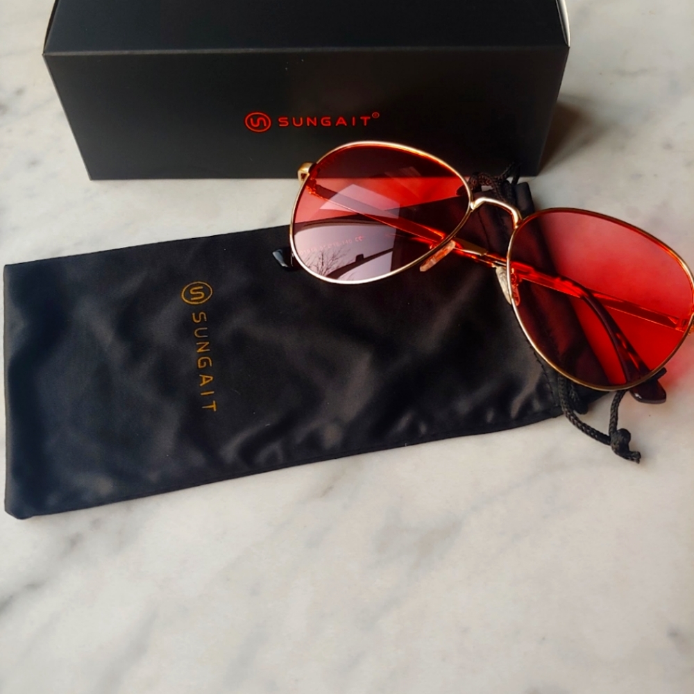Red tinted sunglasses